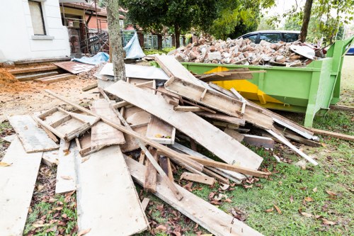 Professionals conducting flat clearance in New Cross